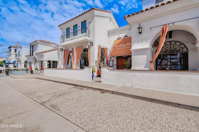 2511 W Queen Creek Rd Unit 374, Chandler, AZ 85248 - view of side of property with a tiled roof and stucco siding