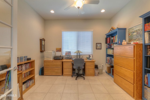 office space with ceiling fan and light tile patterned flooring