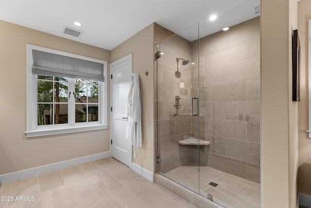 full bath featuring recessed lighting, baseboards, visible vents, a shower stall, and tile patterned floors