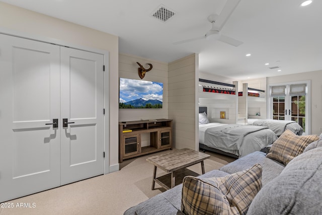 carpeted bedroom with visible vents, french doors, ceiling fan, and recessed lighting