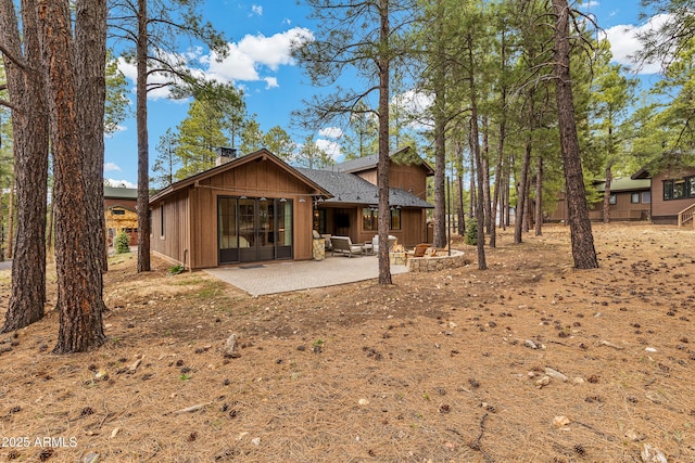 rear view of property with a patio