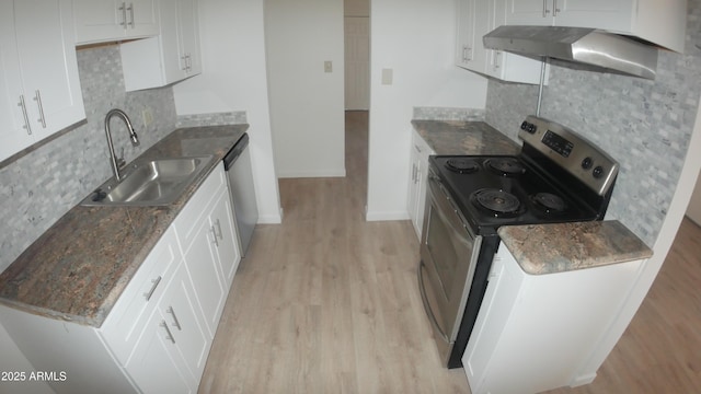 kitchen featuring white cabinetry, sink, tasteful backsplash, and appliances with stainless steel finishes