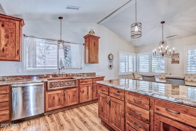 kitchen featuring stainless steel dishwasher, brown cabinets, visible vents, and lofted ceiling