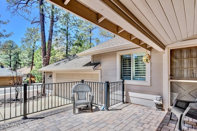view of patio with an attached garage