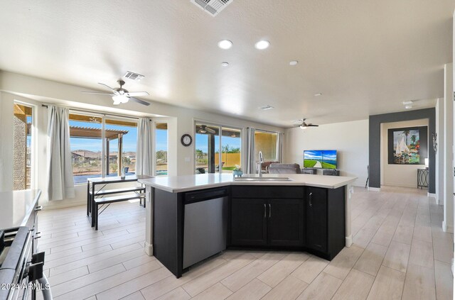 16918 S 180th Dr, Goodyear, AZ 85338 - kitchen with visible vents, appliances with stainless steel finishes, a sink, light countertops, and recessed lighting