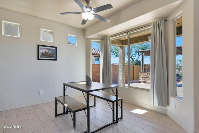 16918 S 180th Dr, Goodyear, AZ 85338 - kitchen featuring ceiling fan, a sink, light countertops, stainless steel dishwasher, and visible vents