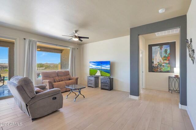 16918 S 180th Dr, Goodyear, AZ 85338 - living area with light wood-style floors, ceiling fan, recessed lighting, and visible vents