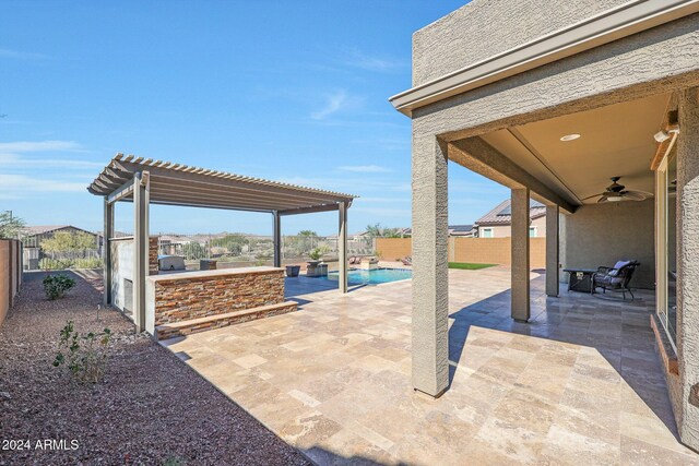16918 S 180th Dr, Goodyear, AZ 85338 - view of patio with a pergola, ceiling fan, a fenced in pool, a fenced backyard, and a fire pit