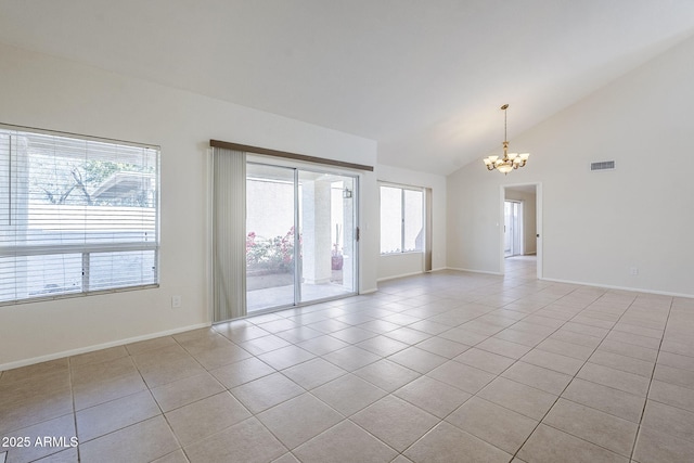 empty room featuring an inviting chandelier, light tile patterned floors, visible vents, and baseboards