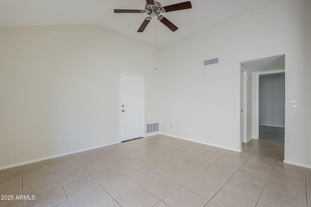 empty room featuring light tile patterned floors, visible vents, baseboards, and a ceiling fan