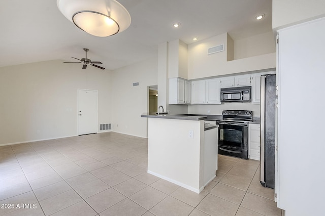 kitchen with light tile patterned floors, visible vents, black appliances, and ceiling fan