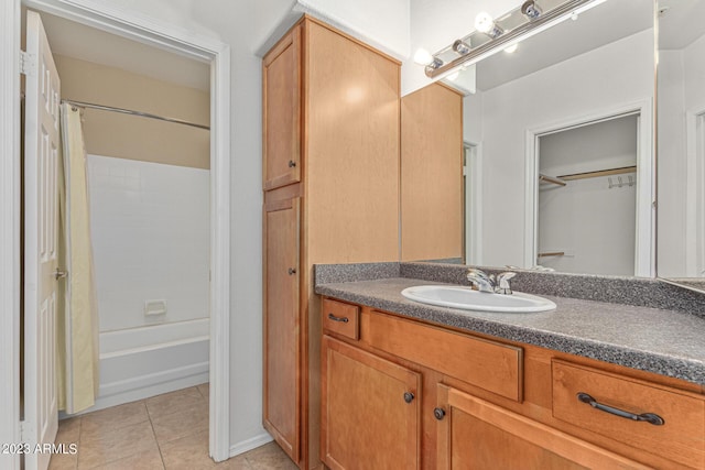 750 E Northern Ave Unit 2045, Phoenix, AZ 85020 - full bath featuring vanity, shower / tub combo, tile patterned flooring, and a walk in closet