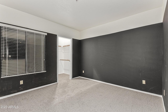 750 E Northern Ave Unit 2045, Phoenix, AZ 85020 - spare room featuring carpet flooring and baseboards