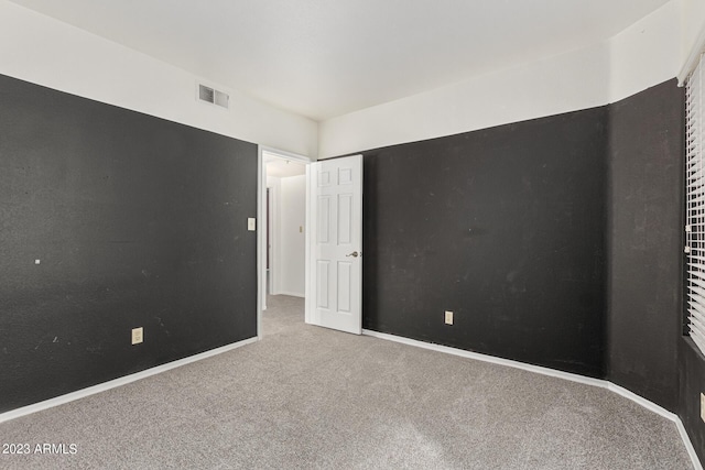 750 E Northern Ave Unit 2045, Phoenix, AZ 85020 - unfurnished bedroom with carpet flooring and baseboards