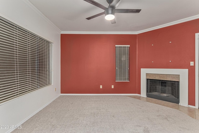 750 E Northern Ave Unit 2045, Phoenix, AZ 85020 - unfurnished living room with crown molding, ceiling fan, a tiled fireplace, and carpet flooring