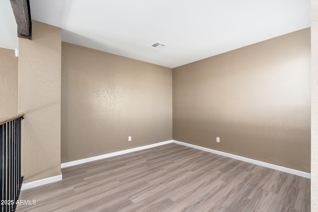 20818 N 21st Dr, Phoenix, AZ 85027 - empty room featuring baseboards, visible vents, and wood finished floors