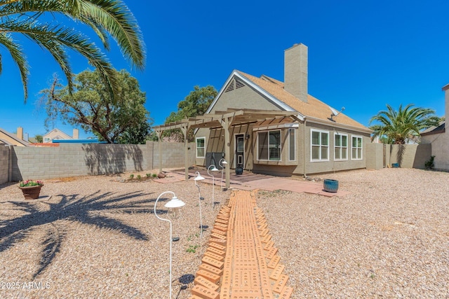 20818 N 21st Dr, Phoenix, AZ 85027 - rear view of house with a pergola, a fenced backyard, stucco siding, a chimney, and a patio area