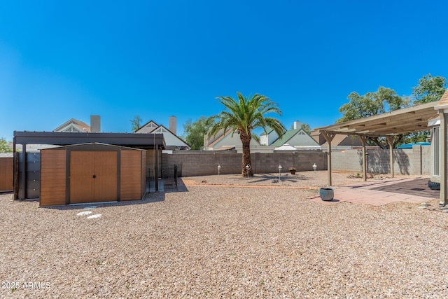 20818 N 21st Dr, Phoenix, AZ 85027 - view of yard with a patio area, an outdoor structure, a fenced backyard, and a storage unit