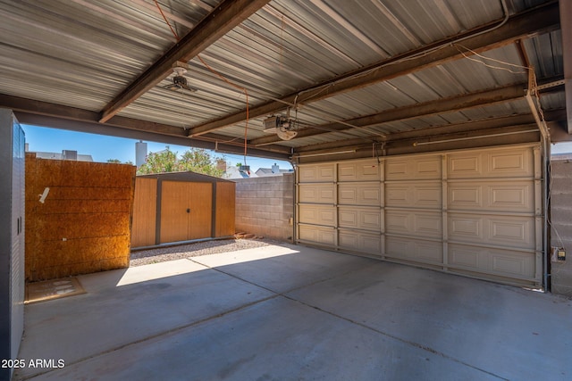 20818 N 21st Dr, Phoenix, AZ 85027 - garage featuring a garage door opener, a ceiling fan, and a shed