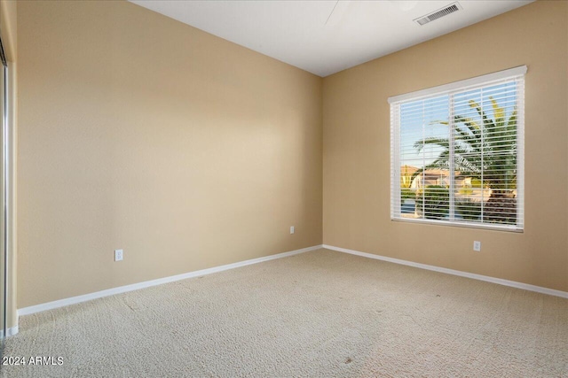 unfurnished room featuring carpet floors