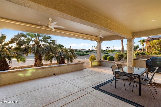 view of patio / terrace with area for grilling and ceiling fan