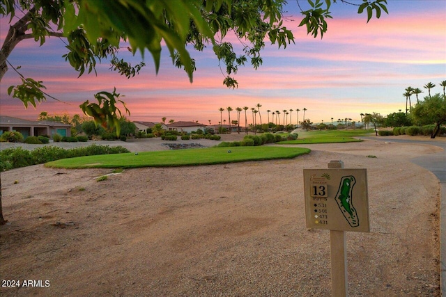 view of home's community featuring a yard