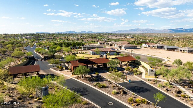 birds eye view of property featuring a mountain view