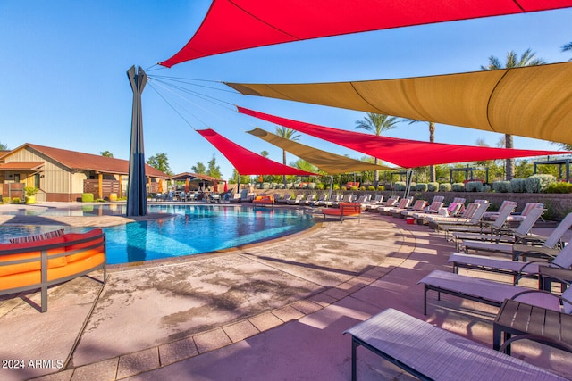 view of swimming pool featuring a patio