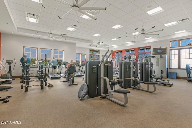 exercise room featuring a paneled ceiling