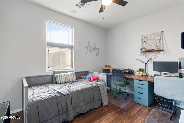 bedroom featuring dark hardwood / wood-style floors and ceiling fan