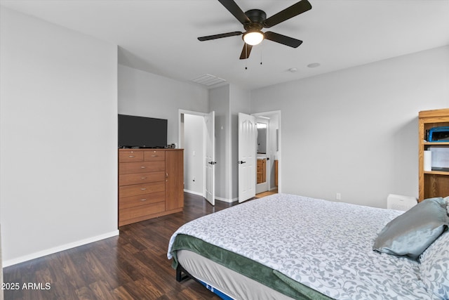 bedroom with dark hardwood / wood-style floors and ceiling fan