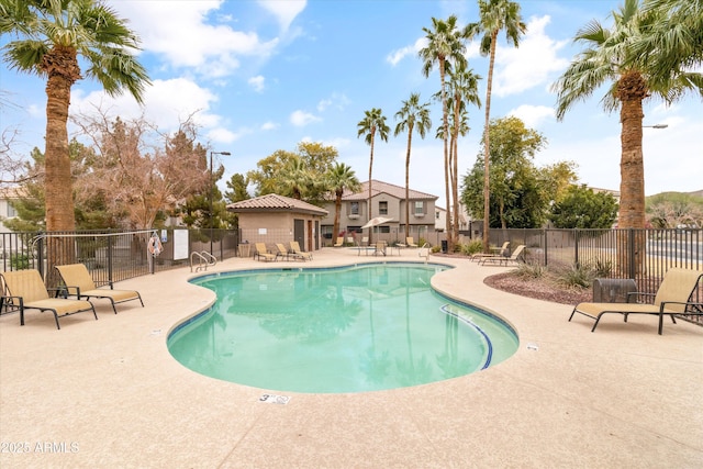 view of swimming pool with a patio area