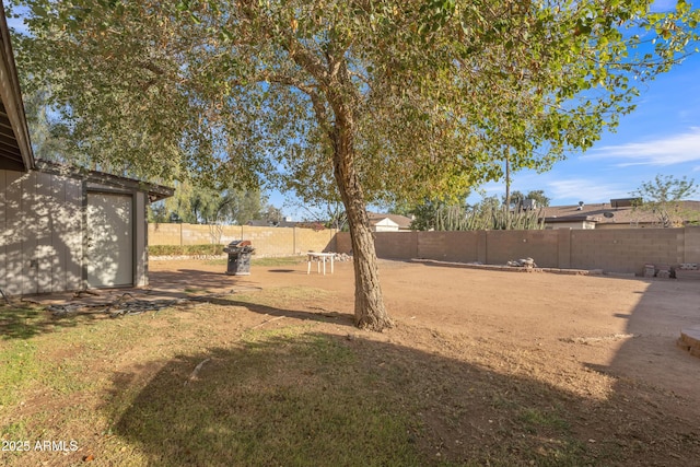 view of yard featuring a fenced backyard