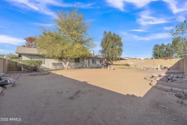 view of yard featuring a fenced backyard