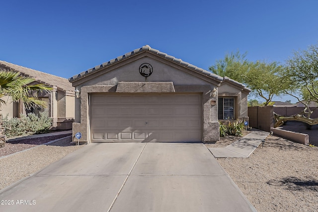 11101 E Abilene Ave, Mesa, AZ 85208 - ranch-style home with concrete driveway, an attached garage, and stucco siding