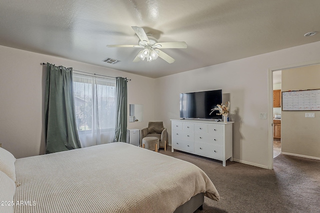 11101 E Abilene Ave, Mesa, AZ 85208 - bedroom featuring dark carpet and a ceiling fan
