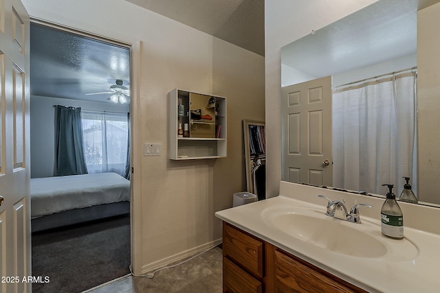 11101 E Abilene Ave, Mesa, AZ 85208 - ensuite bathroom featuring vanity, ceiling fan, tile patterned floors, and a shower with curtain