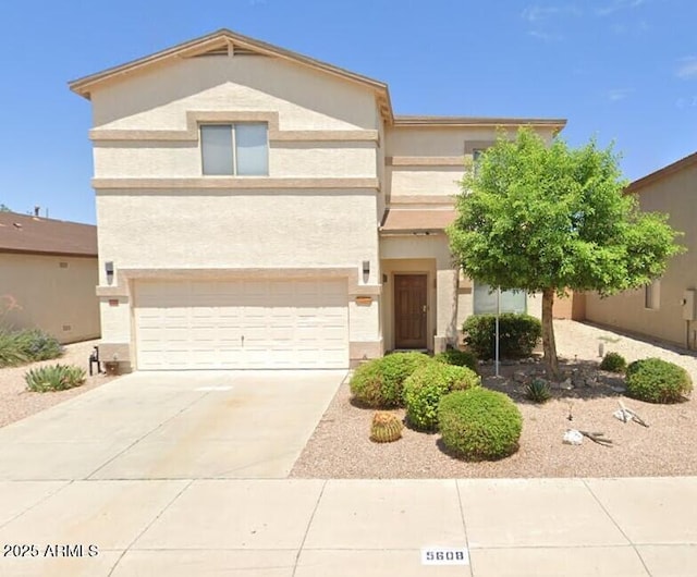 view of front of home with a garage