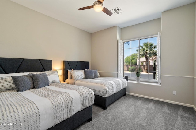 24403 N 43rd Dr, Glendale, AZ 85310 - bedroom featuring visible vents, baseboards, a ceiling fan, and carpet floors