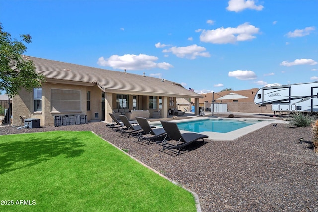 24403 N 43rd Dr, Glendale, AZ 85310 - outdoor pool featuring a patio, an outdoor hangout area, fence, and a lawn