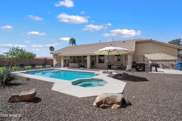 24403 N 43rd Dr, Glendale, AZ 85310 - view of pool featuring outdoor lounge area, a pool with connected hot tub, area for grilling, a fenced backyard, and a patio