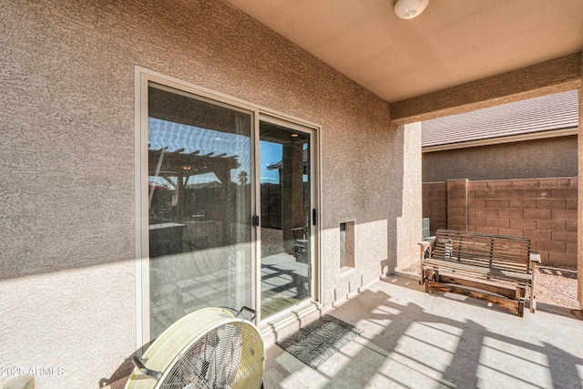 view of patio with fence