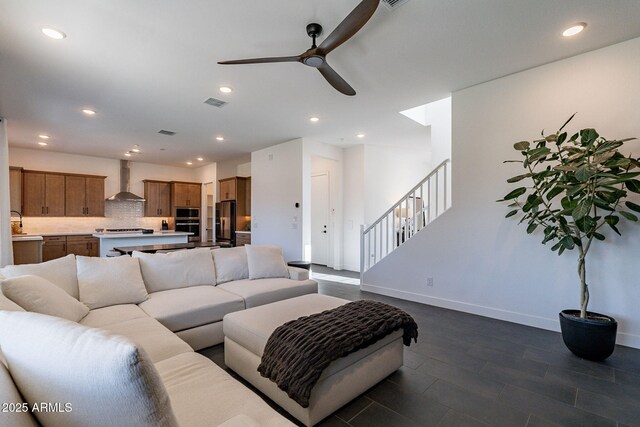22822 E Watford Dr, Queen Creek, AZ 85142 - living area featuring recessed lighting, ceiling fan, stairs, visible vents, and baseboards