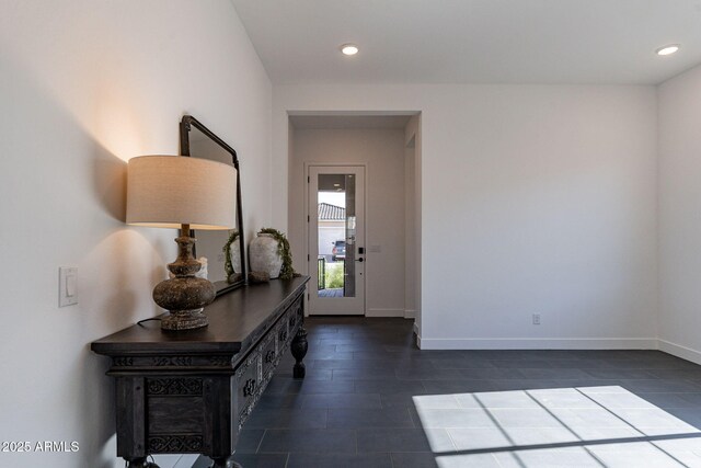 22822 E Watford Dr, Queen Creek, AZ 85142 - entryway with dark tile patterned flooring, recessed lighting, and baseboards