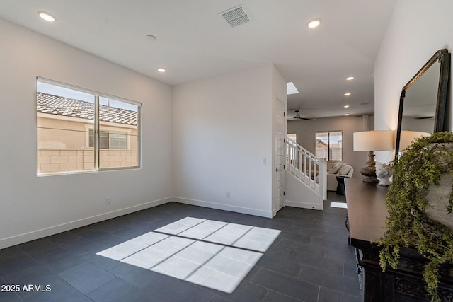 22822 E Watford Dr, Queen Creek, AZ 85142 - empty room with recessed lighting, stairs, visible vents, baseboards, and dark tile patterned flooring