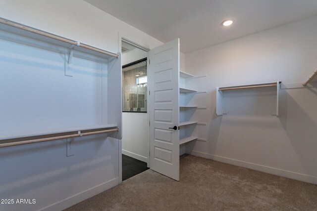 22822 E Watford Dr, Queen Creek, AZ 85142 - walk in closet featuring dark carpet