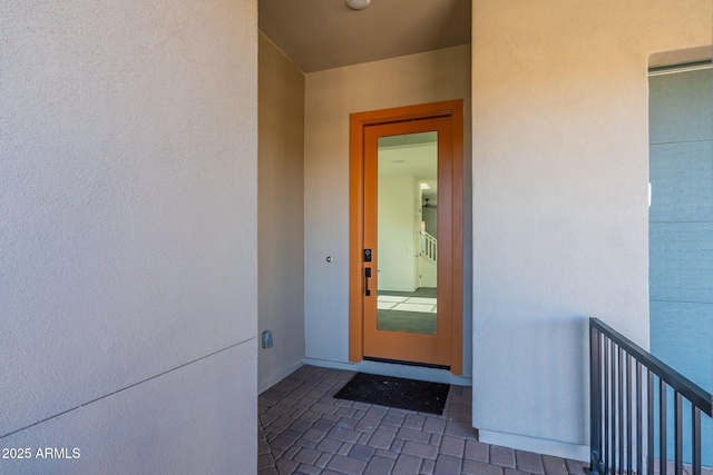 22822 E Watford Dr, Queen Creek, AZ 85142 - doorway to property featuring a balcony and stucco siding