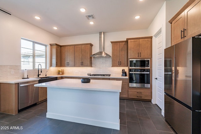 22822 E Watford Dr, Queen Creek, AZ 85142 - kitchen with wall chimney range hood, a sink, stainless steel appliances, and backsplash