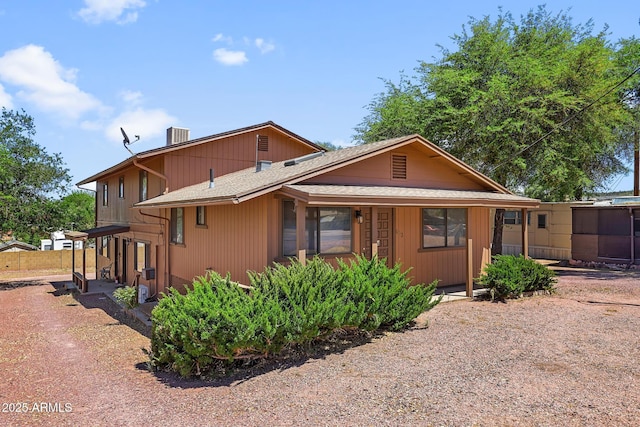 603 S Colcord Rd, Payson, AZ 85541 - view of front of home featuring a shingled roof and a chimney