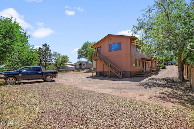603 S Colcord Rd, Payson, AZ 85541 - view of side of property with cooling unit, stairs, and dirt driveway